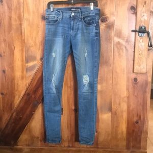 Mid Rise Distressed Jeans